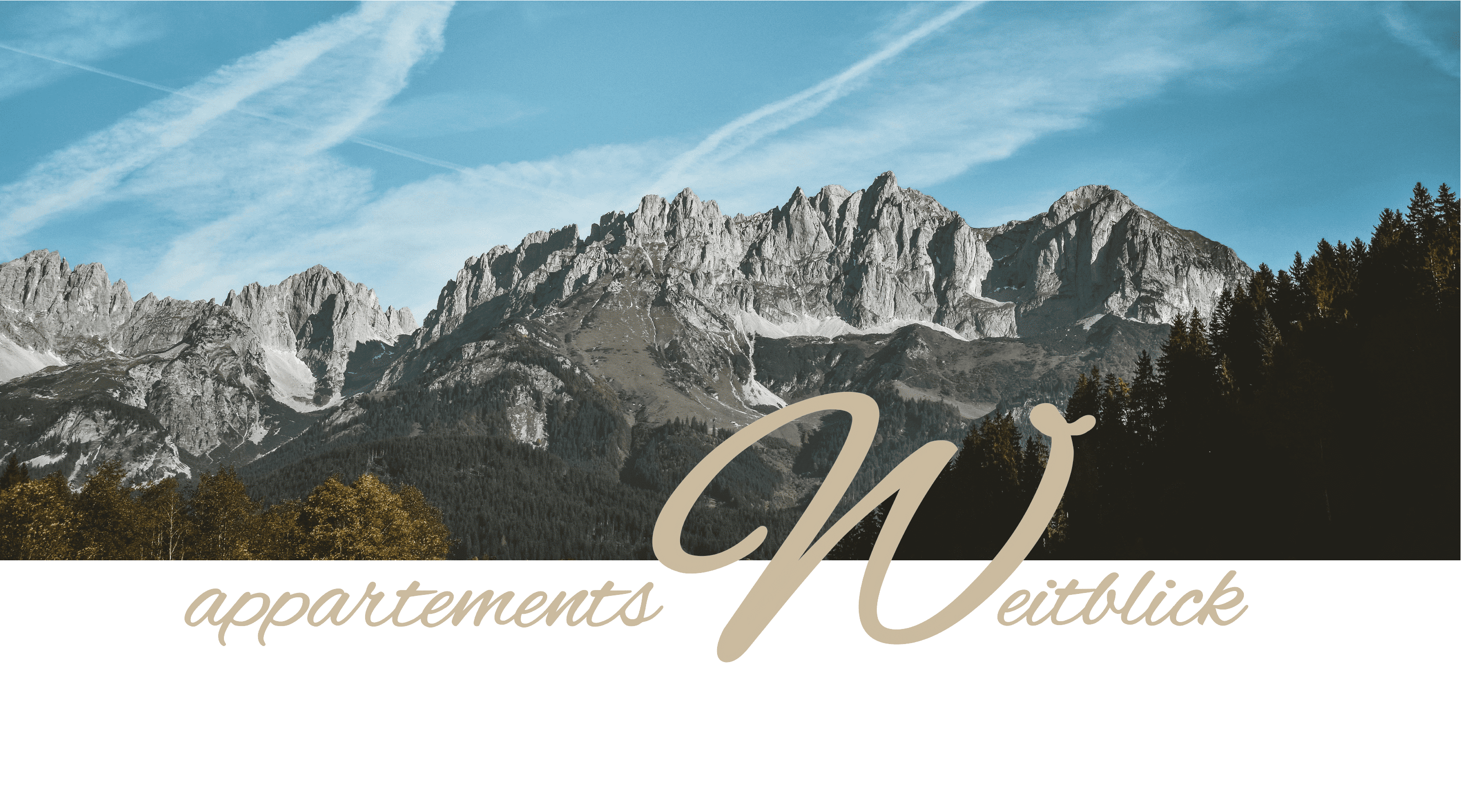 Südsicht auf den Wilden Kaiser mit Schriftzug Appartements Weitblick